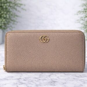 Gucci  Leather Zip Around Wallet.